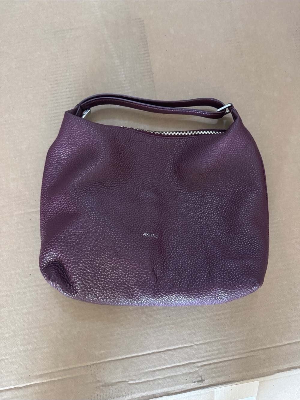 Auxiliary Pebbled Leather Shoulder Bag in Plum